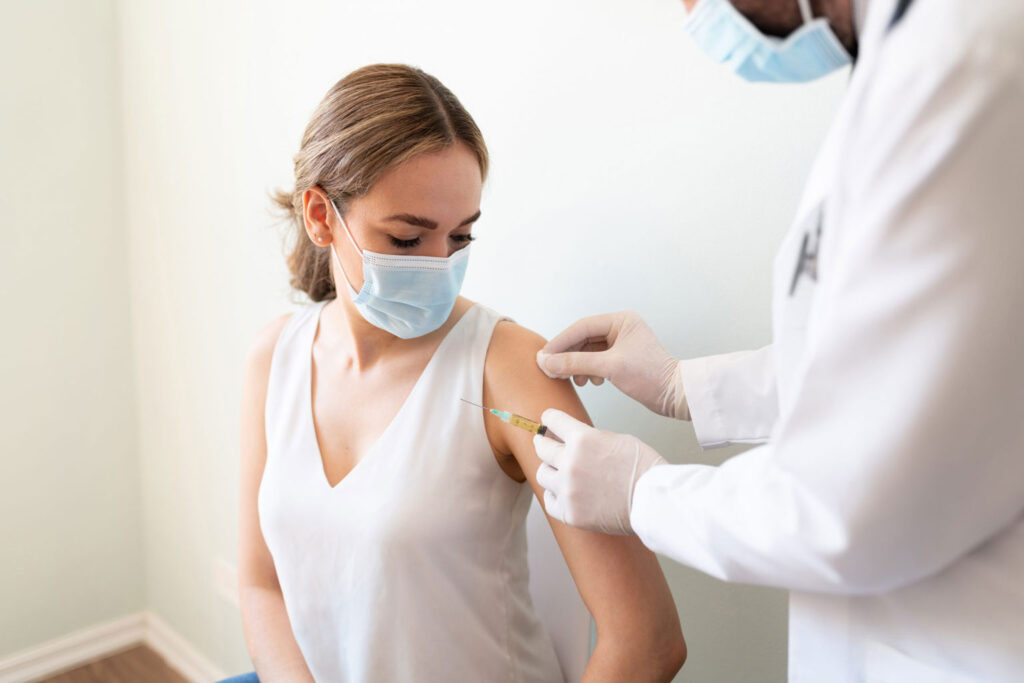 female being vaccinated