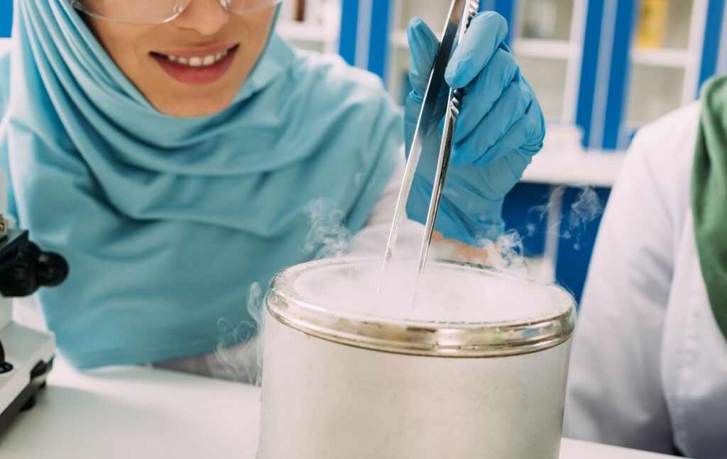 lab scientist using ULT equipment