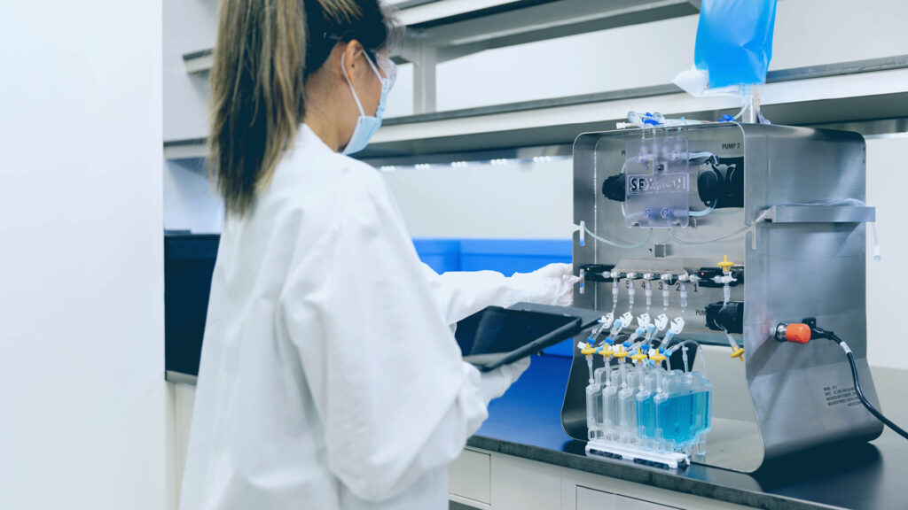 Lab Technician filling the CellSeal CryoCase for Cell and Gene Therapy Storage